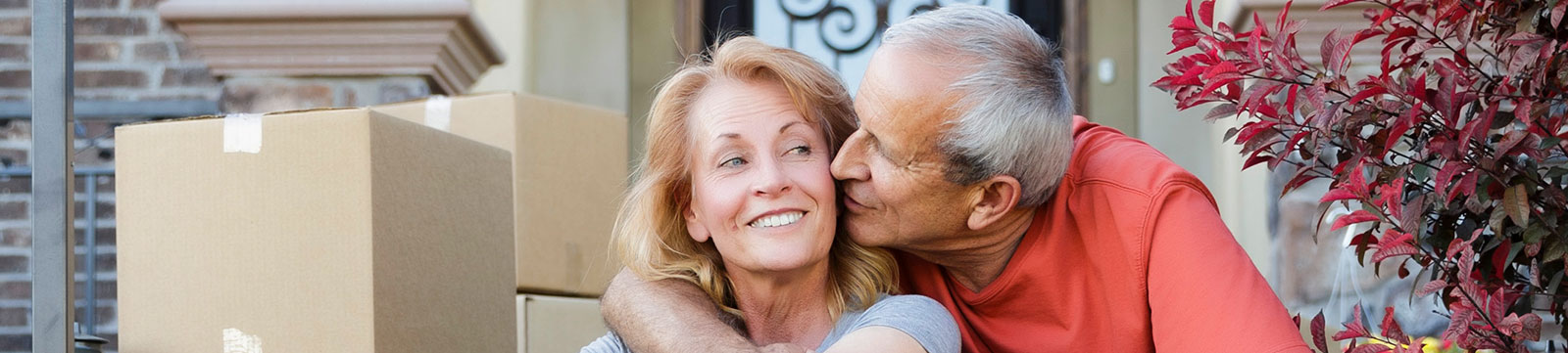 Mature couple moving into new house